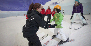 Beginners Skiing or Snowboarding Lesson